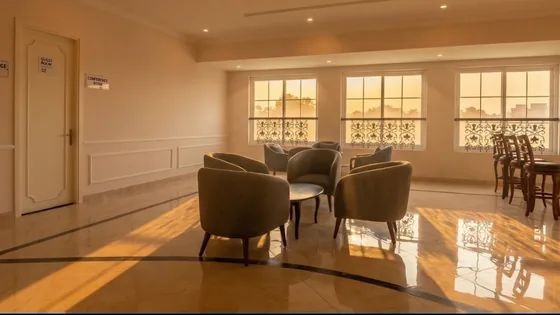 Clubhouse lounge and conference level with tall arched windows